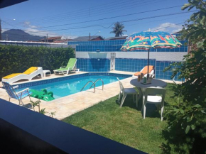 CASA TÉRREA COM PISCINA À 100 MTS DA PRAIA